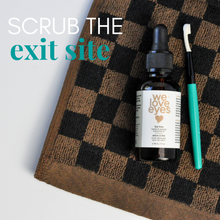 Load image into Gallery viewer, Bottle of 'we love eyes' product with a dropper on a checkered towel.