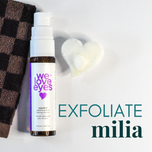 Load image into Gallery viewer, Bottle of 'we love eyes' exfoliating product with a checkered towel and heart-shaped object on a light background