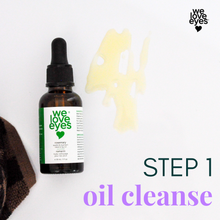 Load image into Gallery viewer, Bottle of 'we love eyes' oil cleanse with a towel and oil on a white background