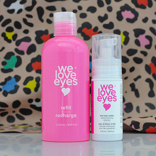 Load image into Gallery viewer, Two 'we love eyes' skincare products on a reflective surface with a colorful leopard print background.