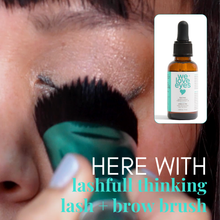 Load image into Gallery viewer, Person applying eyelash serum with a brush, product bottle included