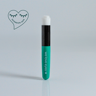 Teal eyelash extension tube with black cap on a light gray background, featuring 'we love eyes' branding.