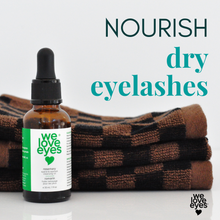 Load image into Gallery viewer, Bottle of 'We Love Eyes' eyelash serum with text promoting nourishing dry eyelashes on a white background.
