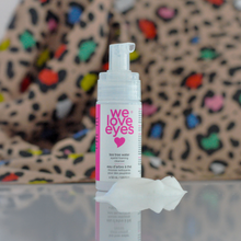 Load image into Gallery viewer, Skincare product labeled 'we love eyes' with a colorful leopard print background
