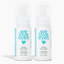 Load image into Gallery viewer, Two bottles of 'we love eyes' tea tree eyelid &amp; eyelash foaming cleanser on a white background

